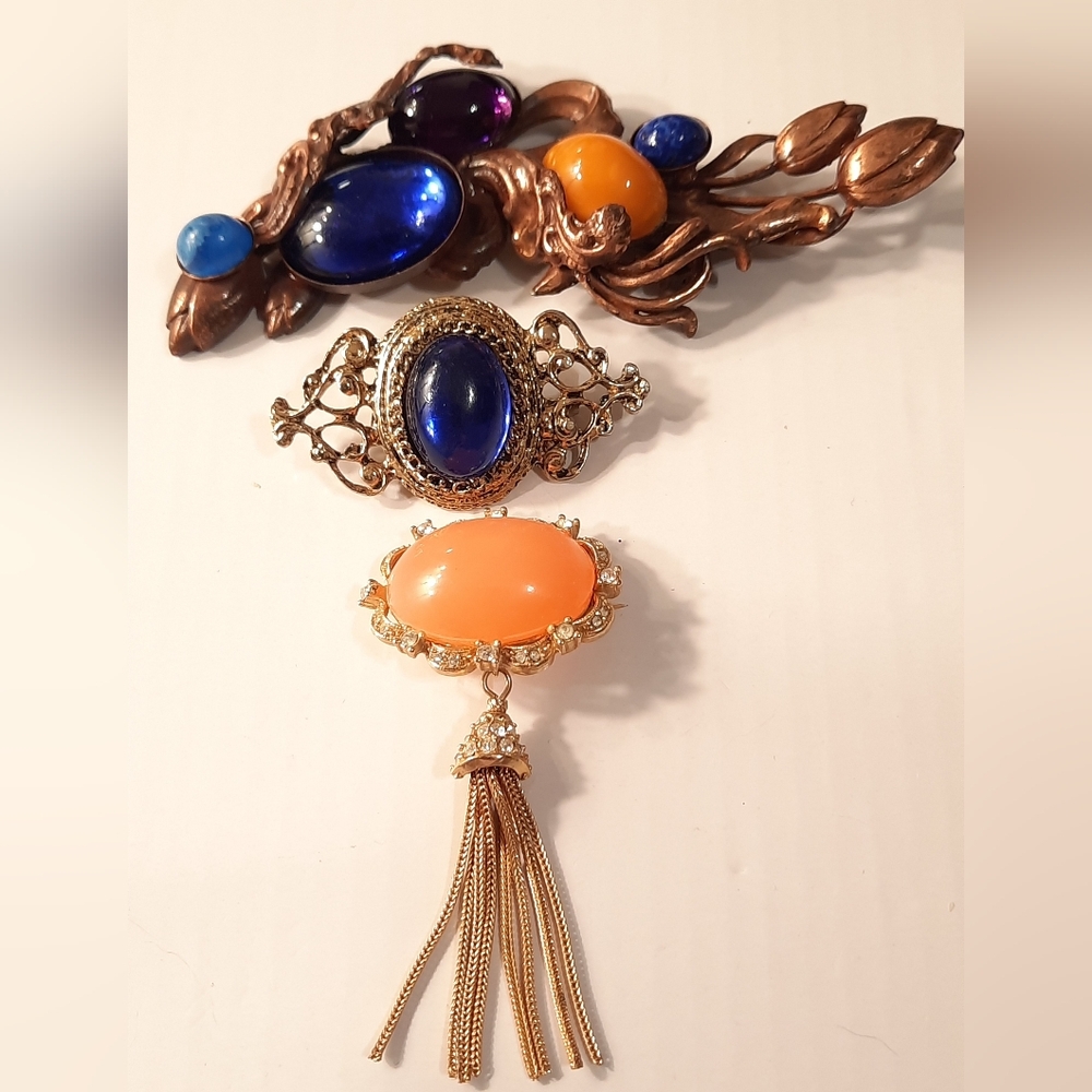 Elegant Gold and Orange Brooch